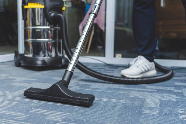 Open plan office carpet being cleaned after hours